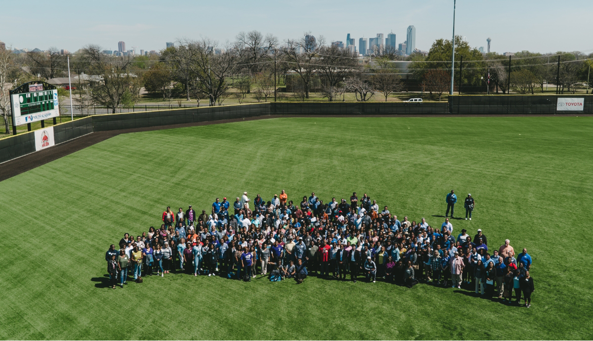 Photo of DHA team on baseball field